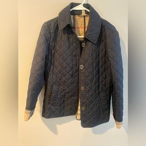 Burberry women’s jacket size M. Color Blue with Burberry plaid inside.